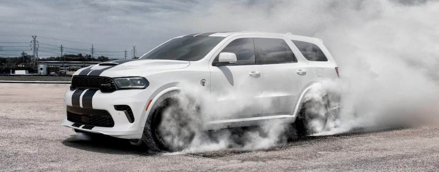 A white 2021 Dodge Durango Hellcat is shown from the side.