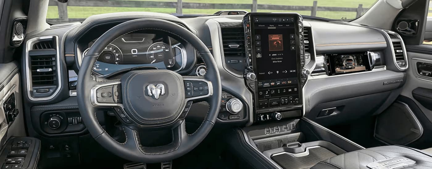 The center console and steering wheel in a 2025 Ram 1500.